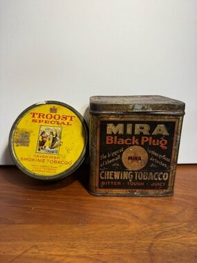 Two vintage tobacco tins.